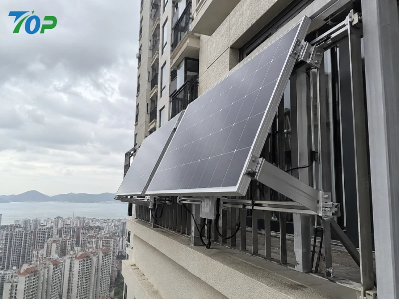 High-rise balcony PV system with wind-resistant aluminum mounting rails and stainless steel railing clamps installed on urban apartment façade